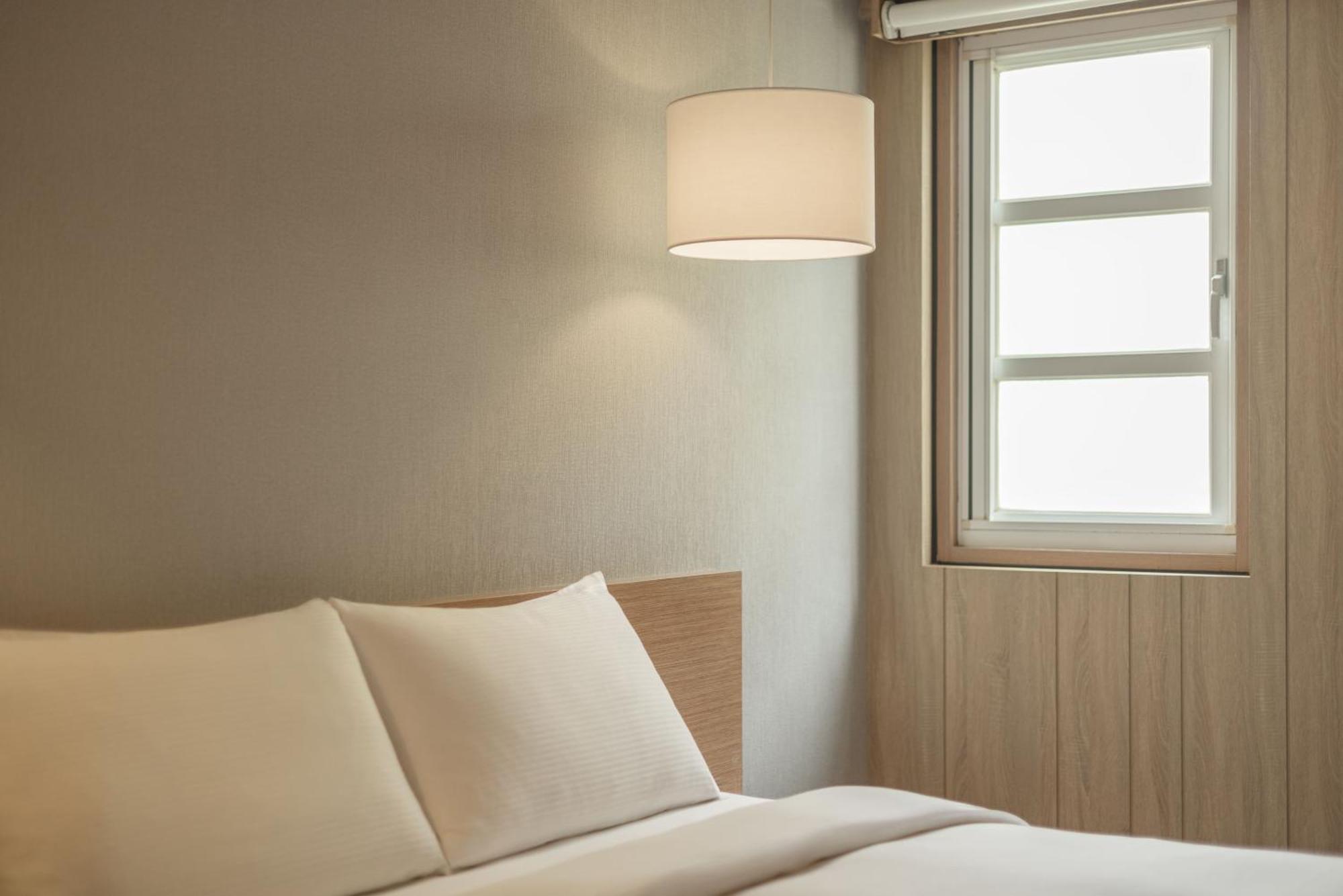 Kindness Hotel - Tainan Chihkan Tower Rum bild